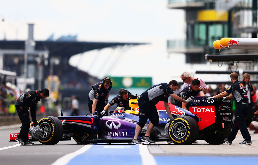 Vettel dă vina pe temperatura ridicată şi vânt pentru ratarea pole-ului - Poza 1