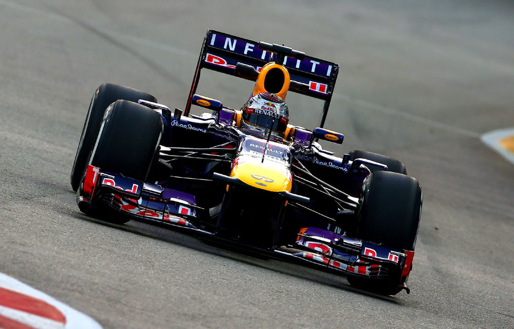 Vettel a câştigat cursa în nocturnă din Singapore, Alonso şi Raikkonen pe podium - Poza 1