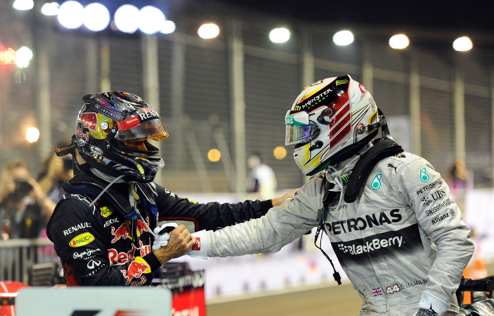 Hamilton admite că depăşirea lui Vettel în finalul cursei din Singapore a fost riscantă - Poza 1