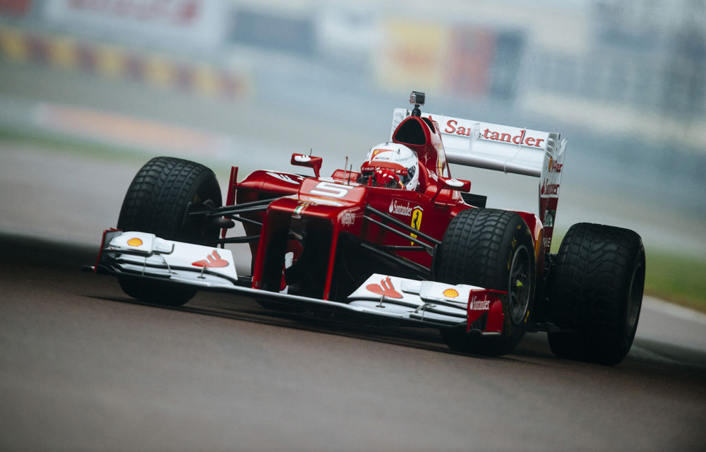 Galerie foto şi video: Vettel a efectuat primul test pentru Ferrari - Poza 19