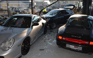 Buturuga mică avariază showroom-ul mare: un Opel Astra a distrus un showroom Porsche