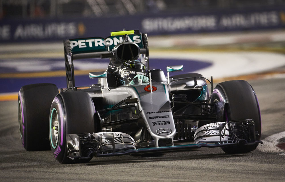 Rosberg a câștigat în Singapore și a devenit liderul clasamentului. Ricciardo și Hamilton, pe podium după o cursă de urmărire fără succes - Poza 1