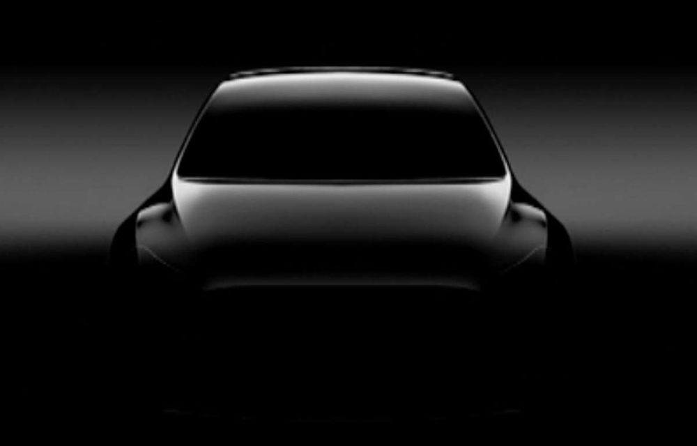 Elon Musk lovește din nou: prima imagine teaser cu Tesla Model Y - Poza 1