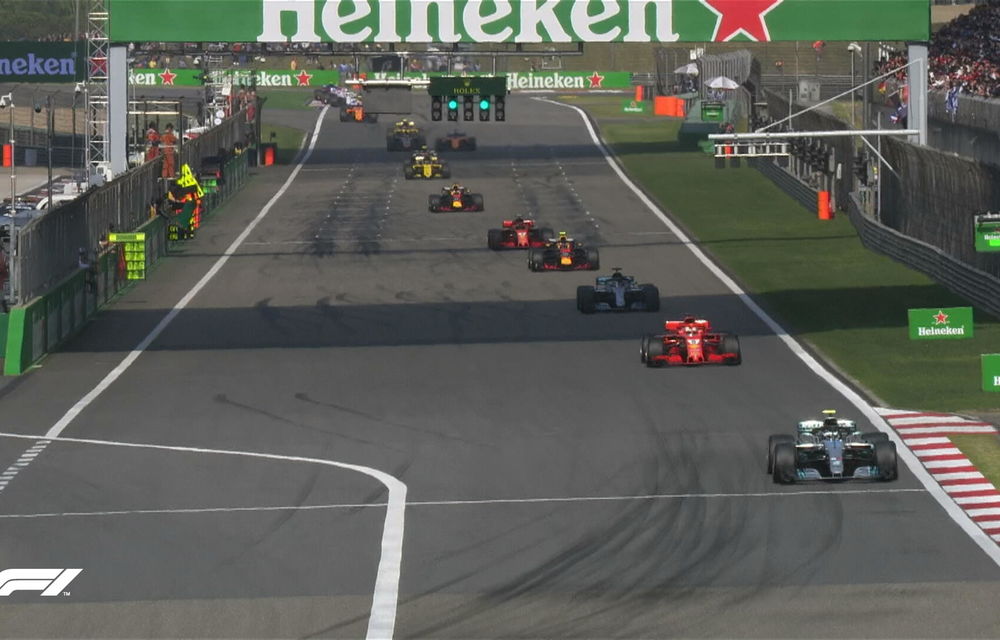 Ricciardo a câștigat cursa din China după patru depășiri pe final! Bottas și Raikkonen, podium după un acroșaj între Vettel și Verstappen - Poza 7