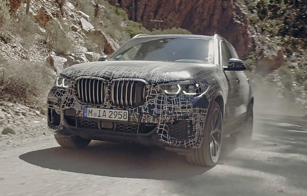 Noua generație BMW X5, testată sub camuflaj în condiții extreme: SUV-ul german va avea direcție integrală și o nouă suspensie - Poza 2