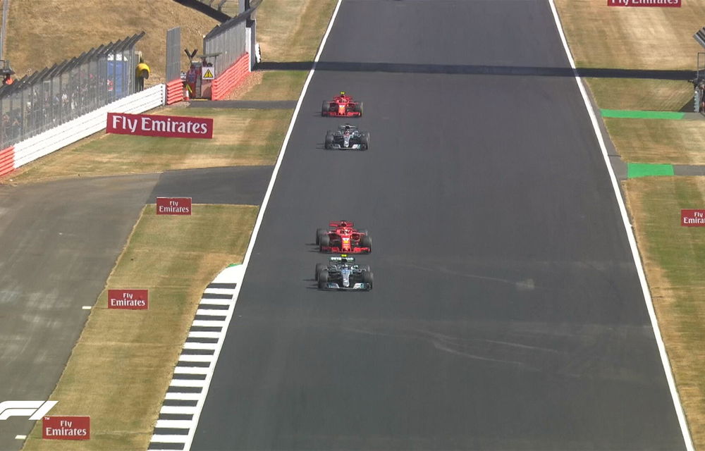 Spectacol la Silverstone: Vettel a câștigat cursa, Hamilton pe locul doi după un acroșaj cu Raikkonen în primul tur - Poza 3