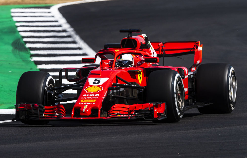 Spectacol la Silverstone: Vettel a câștigat cursa, Hamilton pe locul doi după un acroșaj cu Raikkonen în primul tur - Poza 1