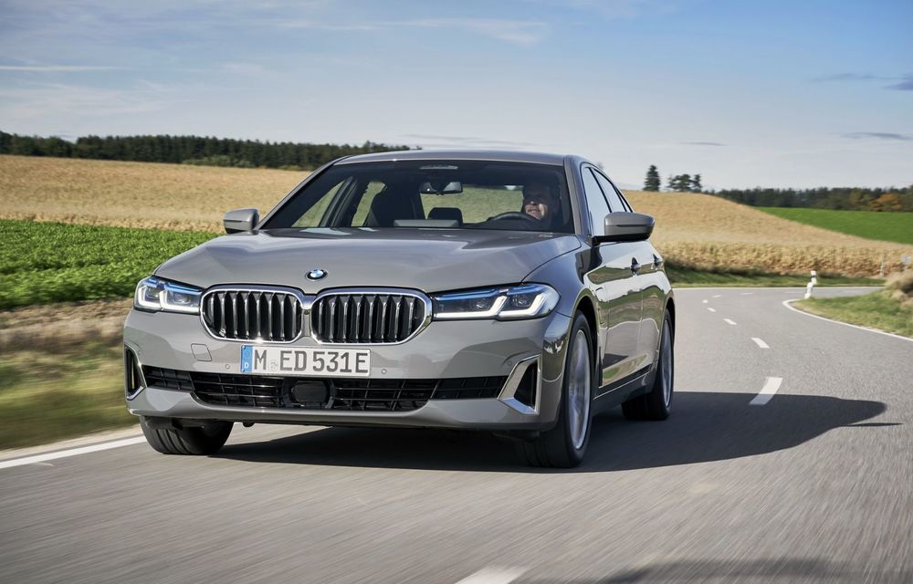 BMW își extinde gama de modele plug-in hybrid cu noile 320e și 520e - Poza 6