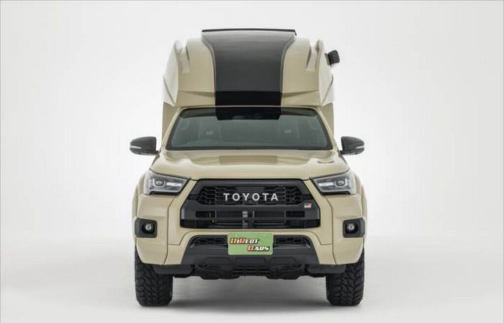 Toyota Hilux, transformat într-un camper de 78.000 de euro: două camere, aer condiționat și panou solar - Poza 3