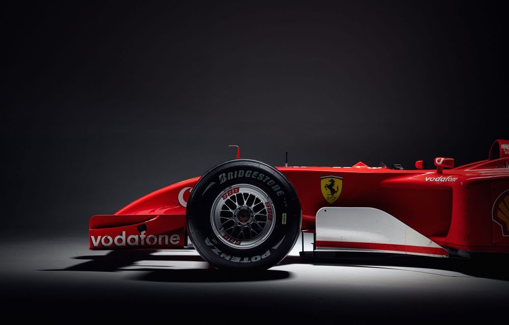 Monopostul Ferrari F2001B, pilotat de Michael Schumacher, scos la licitație - Poza 66