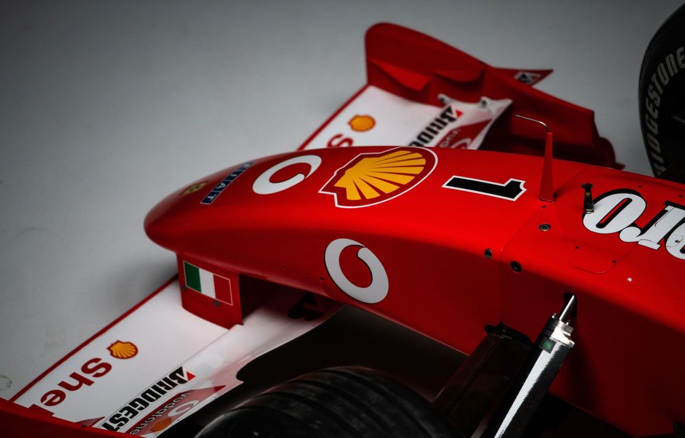 Monopostul Ferrari F2001B, pilotat de Michael Schumacher, scos la licitație - Poza 11