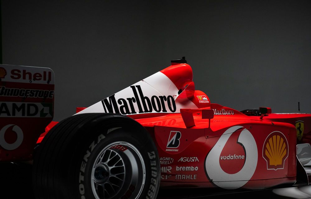 Monopostul Ferrari F2001B, pilotat de Michael Schumacher, scos la licitație - Poza 22